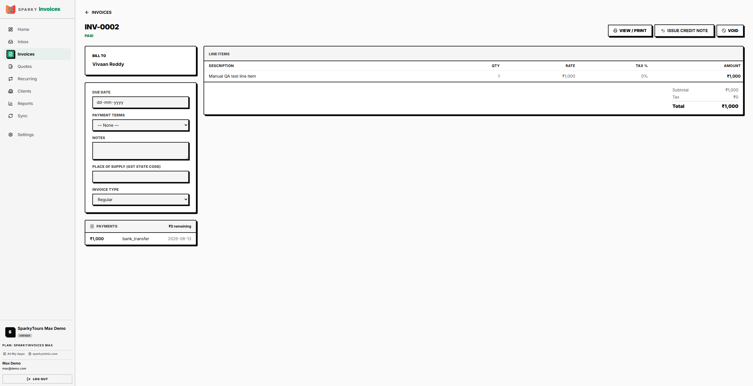 A SparkyInvoices invoice, marked paid, with line items and a recorded payment